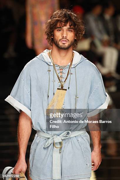 Marlon Teixeira walks the runway during the Balmain Menswear Spring/Summer 2017 show as part of Paris Fashion Week on June 25, 2016 in Paris, France.