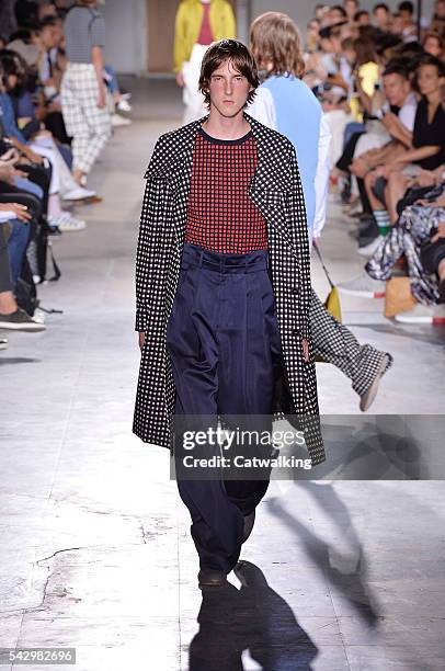 Model walks the runway at the Wooyoungmi Spring Summer 2017 fashion show during Paris Menswear Fashion Week on June 25, 2016 in Paris, France.