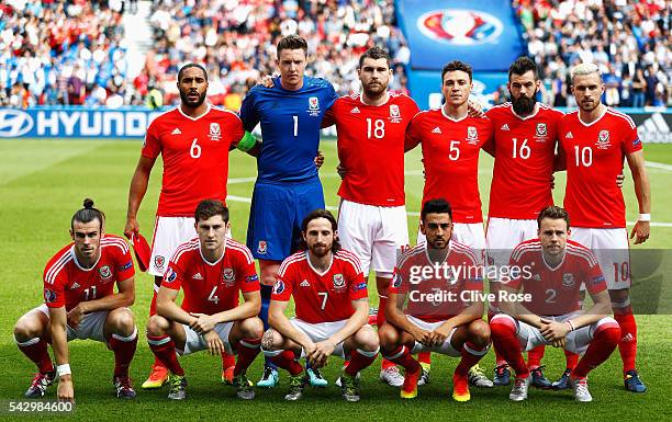 Wales players line up for the team photos prior ot the UEFA EURO 2016 round of 16 match between Wales and Northern Ireland at Parc des Princes on...