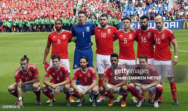 Wales' defender Ashley Williams, Wales' goalkeeper Wayne Hennessey, Wales' forward Sam Vokes, Wales' defender James Chester, Wales' midfielder Joe...