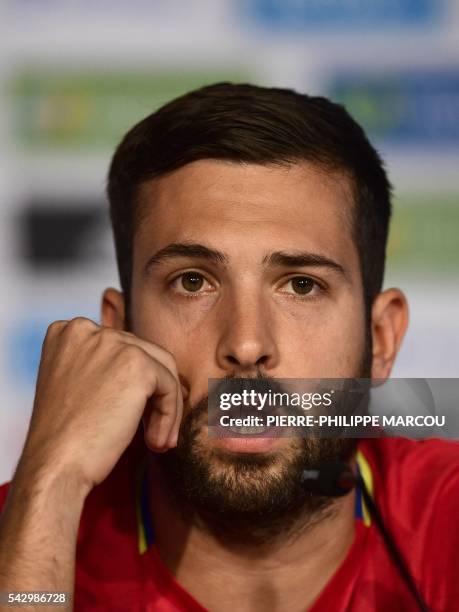 Spain's defender Jordi Alba speaks during a press conference at Saint-Martin-de-Re's stadium on June 25, 2016 during the Euro 2016 football...