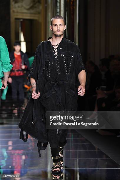 Baptiste Giabiconi walks the runway during the Balmain Menswear Spring/Summer 2017 show as part of Paris Fashion Week on June 25, 2016 in Paris,...