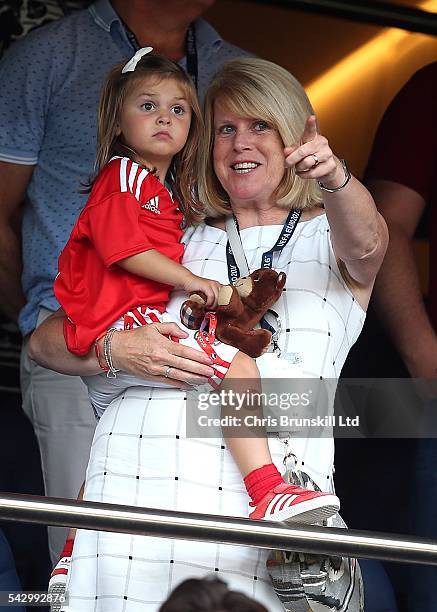 Gareth Bale's mother Deborah Bale holds grand-daughter Alba Bale in her arms during the UEFA Euro 2016 Round of 16 match between Wales and Northern...