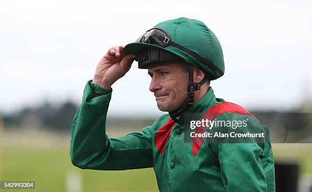 Pat Smullen after riding Harzand to win The Dubai Duty Free Irish Derby at Curragh racecourse on June 25, 2016 in Kildare, Ireland.