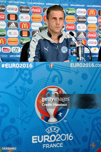 In this handout image provided by UEFA Slovakia defender Peter Pekarik addresses the press before the EURO 2016 1/8th final match between Slovakia...