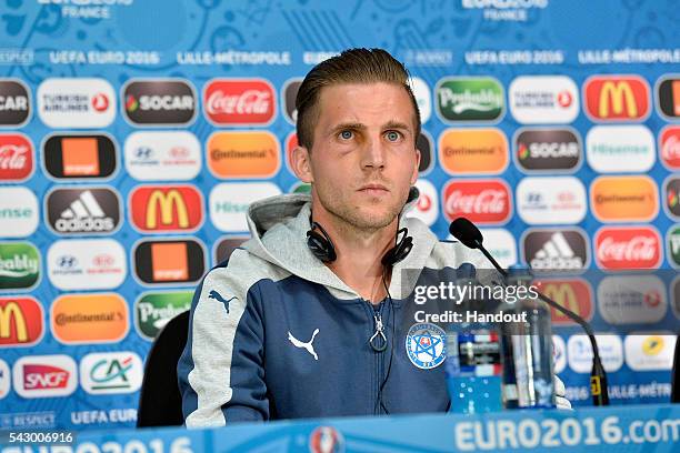 In this handout image provided by UEFA Slovakia defender Peter Pekarik addresses the press before the EURO 2016 1/8th final match between Slovakia...