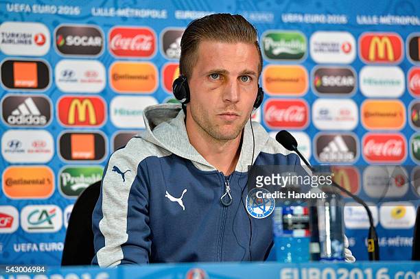 In this handout image provided by UEFA Slovakia defender Peter Pekarik addresses the press before the EURO 2016 1/8th final match between Slovakia...