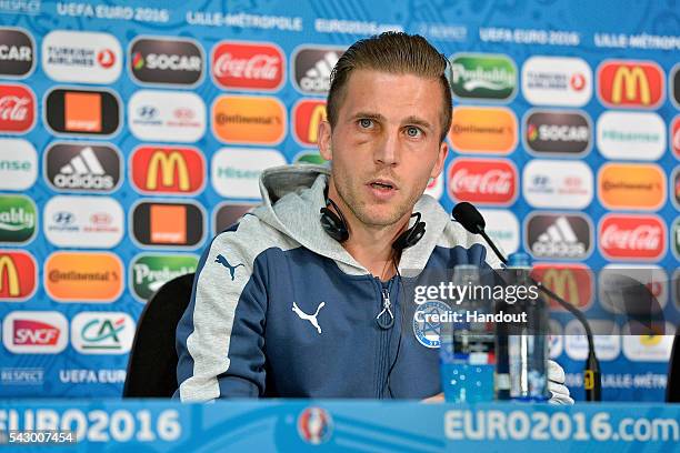 In this handout image provided by UEFA Slovakia defender Peter Pekarik addresses the press before the EURO 2016 1/8th final match between Slovakia...