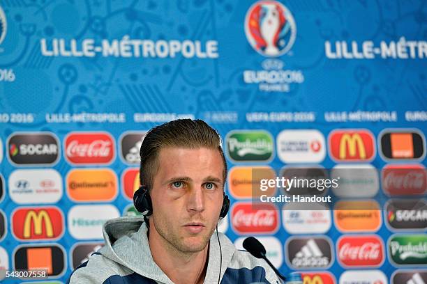 In this handout image provided by UEFA Slovakia defender Peter Pekarik addresses the press before the EURO 2016 1/8th final match between Slovakia...