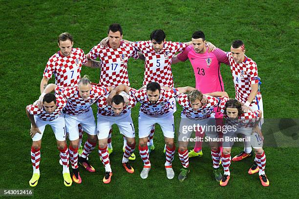 Croatia players line up for the team photos prior to the UEFA EURO 2016 round of 16 match between Croatia and Portugal at Stade Bollaert-Delelis on...