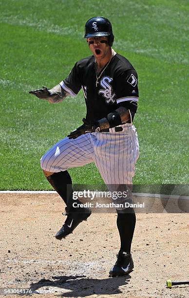 Brett Lawrie of the Chicago White Sox celebrates his solo home run in the 2nd inning against the Toronto Blue Jays at U.S. Cellular Field on June 25,...