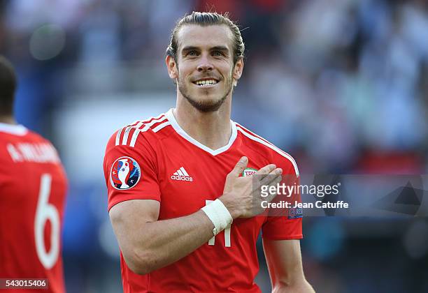 Gareth Bale of Wales celebrates the victory following the UEFA EURO 2016 round of 16 match between Wales and Northern Ireland at Parc des Princes on...