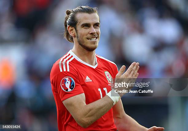 Gareth Bale of Wales celebrates the victory following the UEFA EURO 2016 round of 16 match between Wales and Northern Ireland at Parc des Princes on...