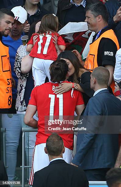 Gareth Bale of Wales meets his wife Emma Rhys-Jones and their daughter Alba Bale following the UEFA EURO 2016 round of 16 match between Wales and...