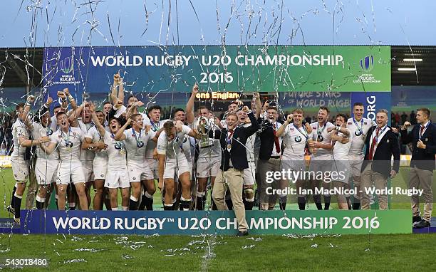 Jack Walker of England lifts the trophy after the final match against Ireland at AJ Bell Stadium on June 25, 2016 in Salford, England.