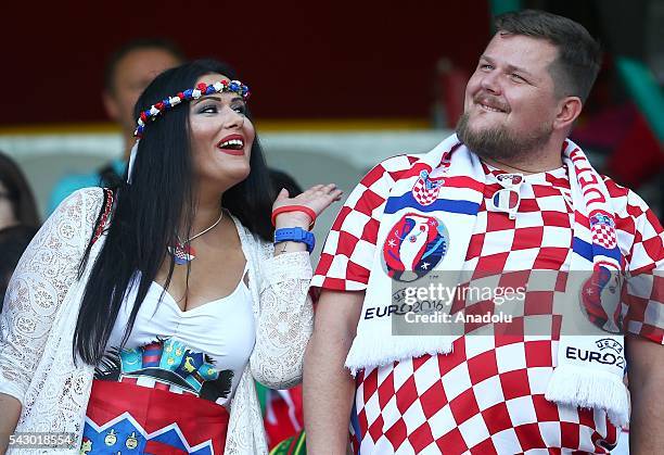 Fans support their team prior to the Euro 2016 round of 16 football match between Croatia and Portugal at Stade Bollaert-Delelis in Lens, France on...