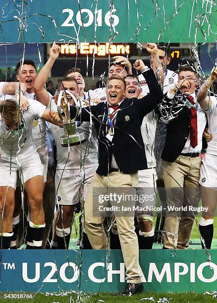 Jack Walker of England lifts the trophy after the final match against Ireland at AJ Bell Stadium on June 25, 2016 in Salford, England.