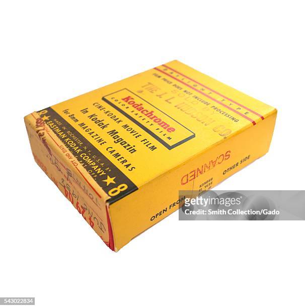 Yellow box for Kodak Kodachrome 8mm color movie film, manufactured by the Eastman Kodak Company, isolated on white background, 1958. .