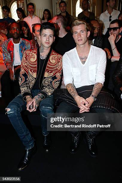 Rapper Travis Mills and Football player Loris Karius attend the Balmain Menswear Spring/Summer 2017 show as part of Paris Fashion Week on June 25,...