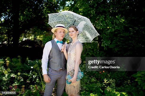 Justin Willard and Megan Nighswander posing for a photo. Gatsby Garden Party is a revival event at the Spadina Museum based on Scott Fitzgeralds...