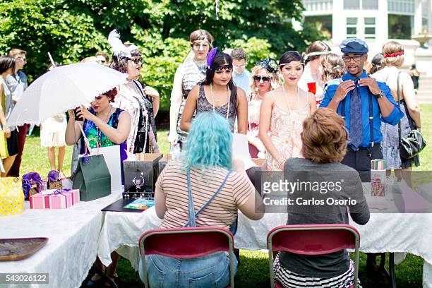 People register for the costume contest. Gatsby Garden Party is a revival event at the Spadina Museum based on Scott Fitzgeralds novel The Great...