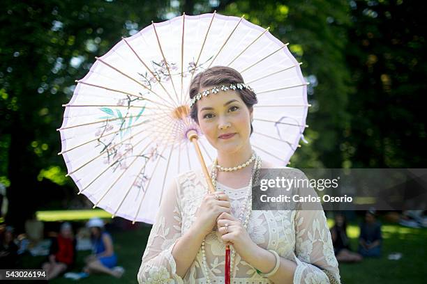 Christy Hockley posing for a photo. Gatsby Garden Party is a revival event at the Spadina Museum based on Scott Fitzgeralds novel The Great Gatsby...