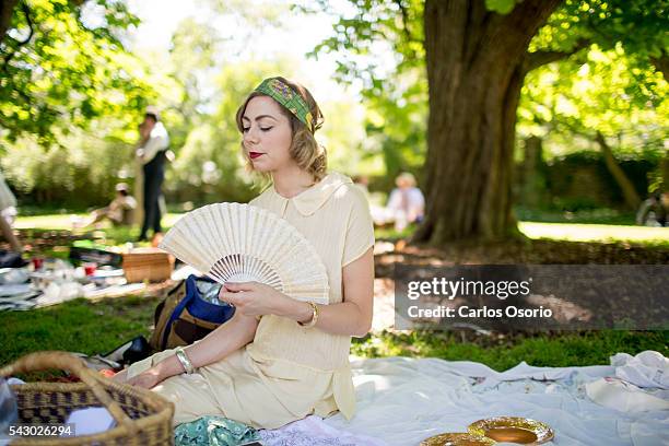 Dana Richardson posing for a photo. Gatsby Garden Party is a revival event at the Spadina Museum based on Scott Fitzgeralds novel The Great Gatsby...