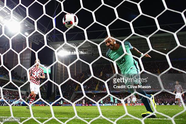Ricardo Quaresma of Portugal heads the ball to score the first goal during the UEFA EURO 2016 round of 16 match between Croatia and Portugal at Stade...