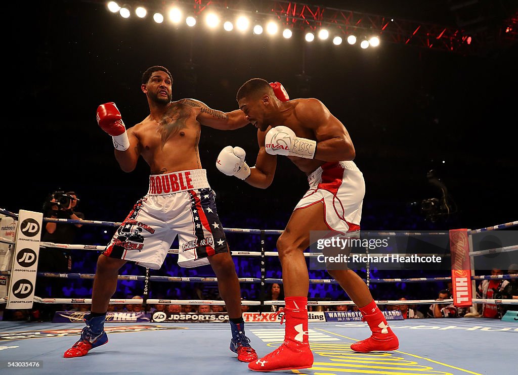 London O2 Boxing Anthony Joshua of Great Britain lands a punch on Dominic Breazeale of ...
