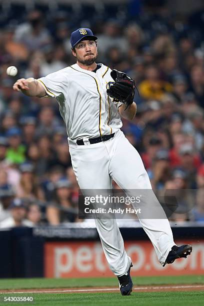 Brett Wallace of the San Diego Padres throws out Wilson Ramos of the Washington Nationals during the fourth inning of a baseball game at PETCO Park...