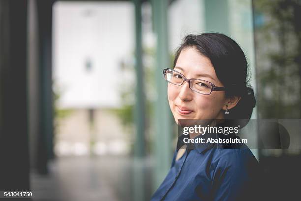 portrait of beautiful japanese businesswoman entrepreneur, kyoto, japan - 2016 25-29 stock pictures, royalty-free photos & images
