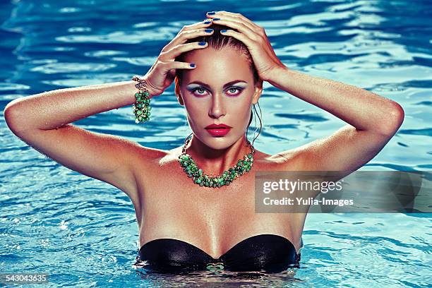 portrait of wet woman with makeup at the pool - vattentät bildbanksfoton och bilder