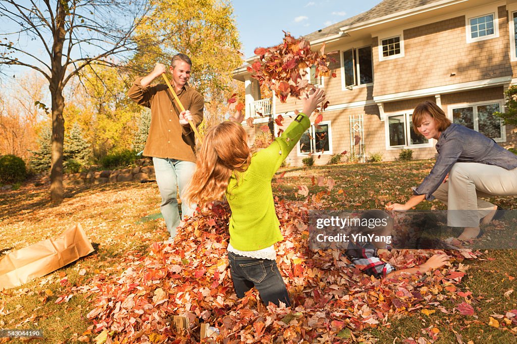 Team Leave Raking Family Raking Autumn Leaves Outdoors Team Together In Home Yard High ...