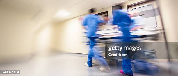 blurred emergency in hospital - er stock pictures, royalty-free photos & images