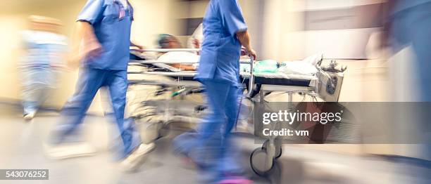 blurred emergency in hospital - stretcher stock pictures, royalty-free photos & images
