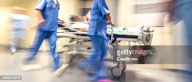 blurred emergency in hospital - bår på hjul bildbanksfoton och bilder