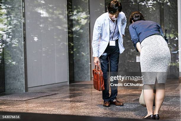 local culture meetings modern business lifestyle - woman bowing stock pictures, royalty-free photos & images