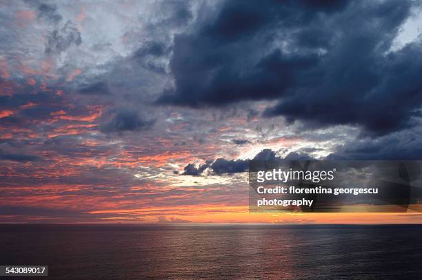 sunset over playa ancon - playa ancon cuba stock-fotos und bilder