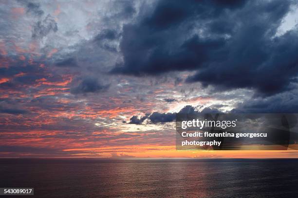 sunset over playa ancon - playa ancon stock pictures, royalty-free photos & images