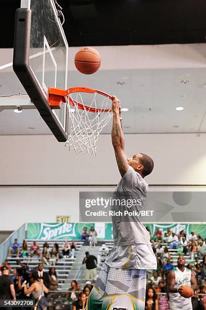 Dunk artist Guy Dupuy participates in the slam dunk contest during the 2016 BET Experience on June 25, 2016 in Los Angeles, California.