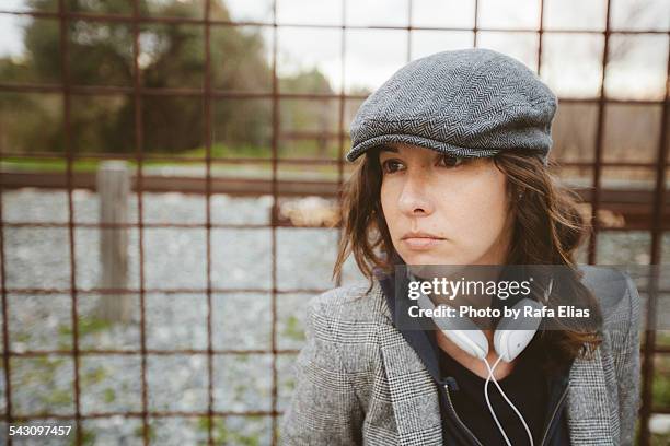 pretty stylish woman with headphones - metallic blazer stock pictures, royalty-free photos & images