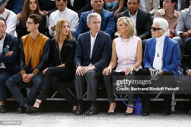 Pierre Niney, Natasha Andrews, Owner of LVMH Luxury Group Bernard Arnault, his wife Helene Arnault and Karl Lagerfeld attend the Dior Homme Menswear...