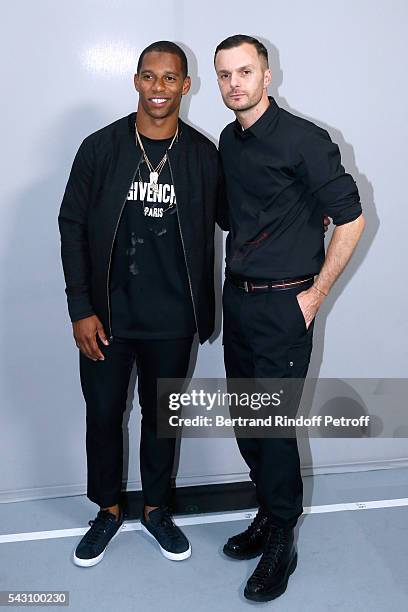 American Football Player Victor Cruz and Fashion designer Kris Van Assche pose Backstage after the Dior Homme Menswear Spring/Summer 2017 show as...