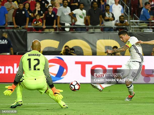Colombia's James Rodriguez kicks against USA's goalkeeper Tim Howard during the Copa America Centenario third place football match in Glendale,...