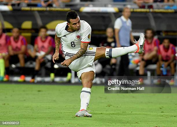 Edwin Cardona of Colombia follows through on a kick during a third place match between United States and Colombia at University of Phoenix Stadium as...