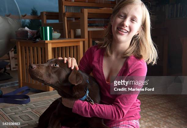 pre-teen girl and brown lab - pedigree ford stock pictures, royalty-free photos & images