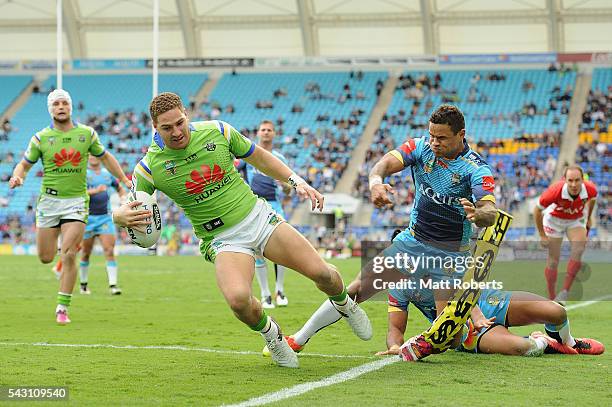 Brenko Lee of the Raiders scores a try during the round 16 NRL match between the Gold Coast Titans and the Canberra Raiders at Cbus Super Stadium on...