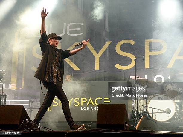 Kev Nish of the group Far East Movement performs onstage during the OUE Skyspace LA grand opening block party at OUE Skyspace LA on June 25, 2016 in...