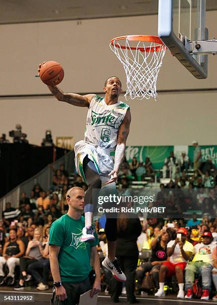 People participate in the slam dunk contest during the 2016 BET Experience on June 25, 2016 in Los Angeles, California.