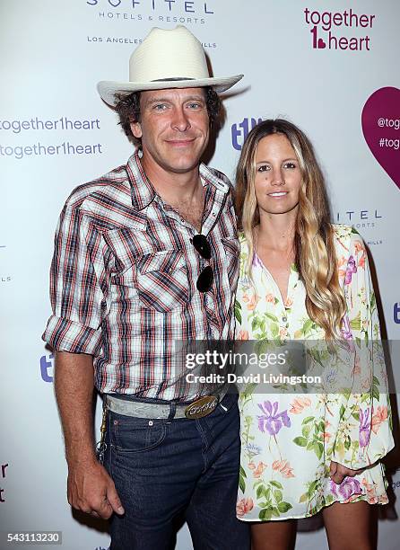 Artists Vince Szarek and Cari Sladek attend together1heart launch party hosted by AnnaLynne McCord at Sofitel Hotel on June 25, 2016 in Los Angeles,...